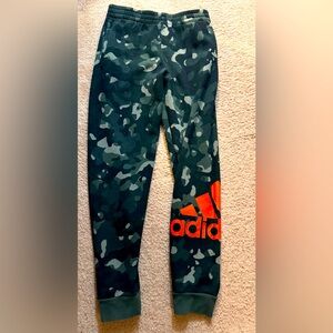Camouflage sweat pants.